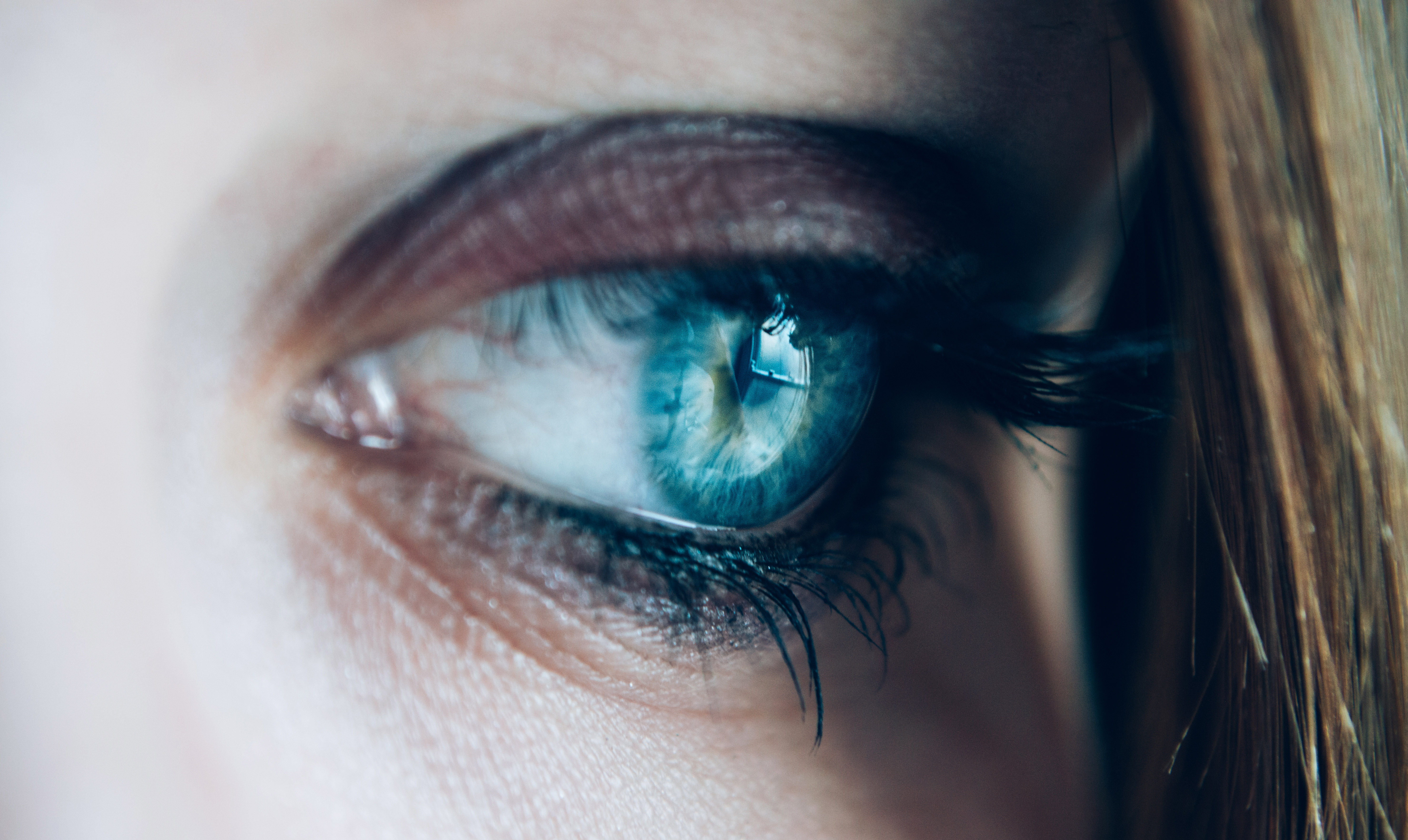 close-up of a the eye of a person thinking